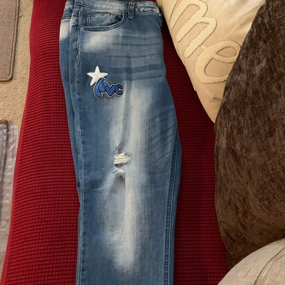 Vanilla star mid rise jeans with rips and patches